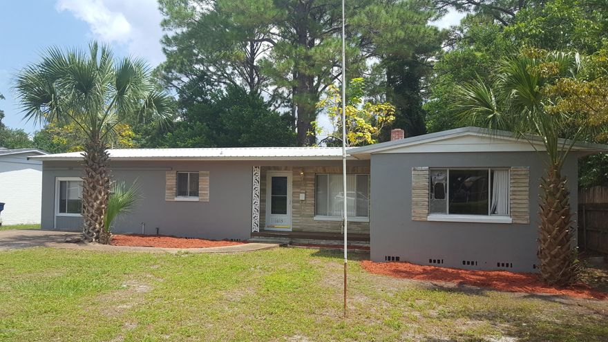 Come on in and check out all of the updates featured in this roomy, light filled home. Beautiful Hardwoods just refinished throughout the home, Fresh paint inside and out.  New Hot water heater, stove and dishwasher. New roof in 2016.  Split bedroom plan or mother in law suite. Enjoy the private shady backyard from the large screened in porch, with new indoor/outdoor carpet. New vanity in main bath, Both tubs just refinished. Seller is offering a one-year AHS home warranty.