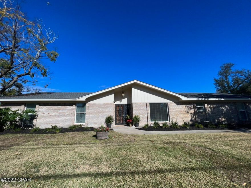 CURRENTLY UNDER CONTRACT, SELLER ACCEPTING BACKUP OFFERS Beautiful 4 bedroom-3 bath home located in the quiet Ashland neighborhood adjacent to the FSU and Gulf Coast State College. This home has been completely remodeled, including new windows, new roof, new A/C duct work and many more upgrades.  The kitchen features modern white shaker cabinets, granite counter tops and stainless-steel appliances. The great room offers a perfect place to entertain. The large open floor plan includes a13-ft kitchen island,  

beverage station, living and dining combo.  The master bedroom has an exposed brick accent wall. The master bath offers double vanities, a large double shower and private potty. The second bathroom is located between two of the bedrooms with private entrance, has two separate vanities This property also includes a 1 bedroom, 1 full bath efficiency apartment. This can be used as a Mother-in-law suite or rental. Current owners have rented to medical students and have a great rental history. In addition to the attached 2-car garage, this property has a detached garage with a covered parking 
area for another car or a boat.  You are in walking distance to the bay and Carl Gray Park which has a boat launch ramp.  The home has a bonus room that can be used for an office or crafts area. There is an additional workshop beside the detached garage. The nice large back yard is completely fenced. You have a nice paver patio that is great for cookouts and a large covered patio.  Make an appointment to see this home today. The antique doors on the beverage cabinet will be replaced with doors to match the kitchen cabinets. The antique chandelier in the hall as you step down to go to the master bedroom will be replaced. Both of these items are from grandparents.  Measurements are approximate, if important, please measure. Listing agent is related to the seller.