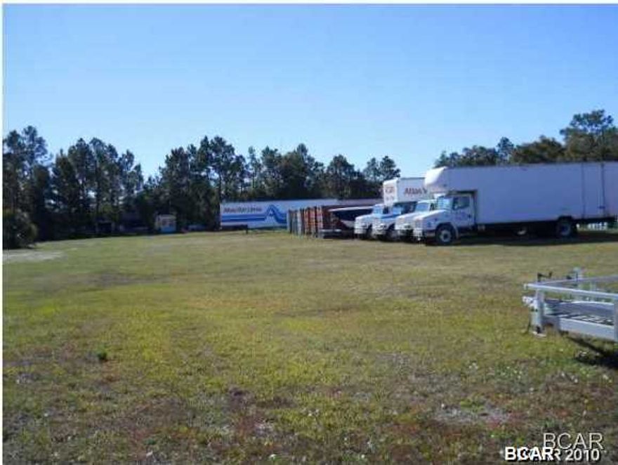 THIS GREAT PIECE OF PROPERTY CONSISTS OF 1.6 ACRES plus or minus depends on final survey . water /sewer on site, rail access available, fenced in w/ 6ft chain link. this property may be leased or owner fianced bring all offers.