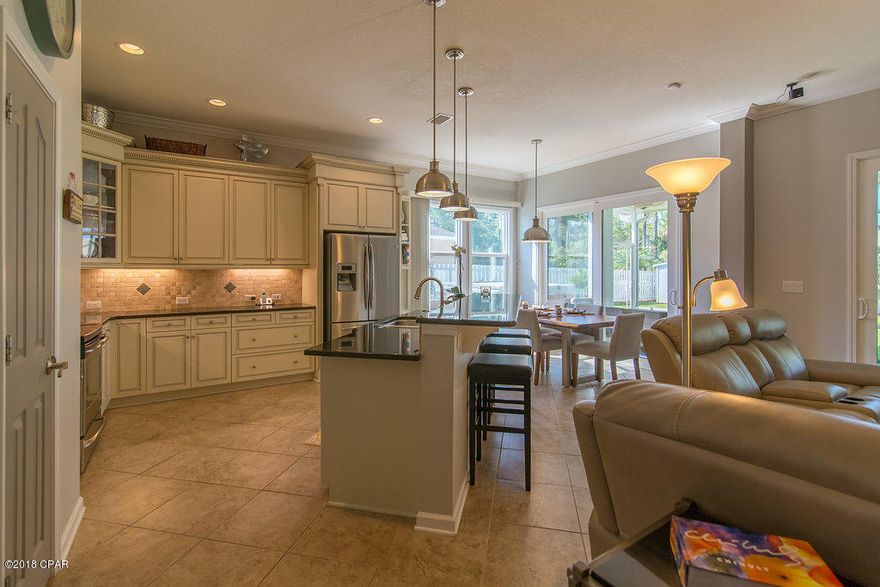 **THE HOT TUB COMES WITH IT** Homes this well-maintained are hard to find. The owners have kept this in truly immaculate condition. Painted outside in 2016, inside in 2017 and with a new HVAC in 2014, this pretty home is neat as a pin. Enjoy a split bedroom floor-plan, open concept and large (beautiful) yard. Reclaimed water outside keeps the water bills down and you're in flood zone X so lower insurance costs. Palmetto Trace is one of the few golf-cart friendly communities in Panama City Beach. Easily zip around two one of two community pools, Frank Brown Park, Pier Park North, Pier Park or the beach. Conveniently located close to the hub of PCB activity. Put this on your show list today.