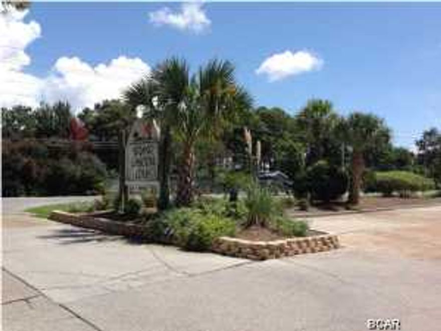 2 bedroom 2.5 bath townhouse in Grand Lagoon Cove. This updated unit has newer tile in the living and bathrooms. The steps to the upstairs are wood and upstairs is all laminate wood flooring. This complex is located on Grand Lagoon and has boat slips for rent. This affordable unit has all the amenities. The dock for fishing, the pool for the kids, and boat slip rentals.