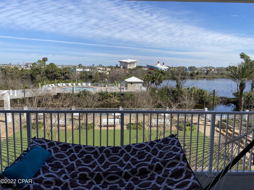 Low Floor 3BR / 3BA Lake View End Unit at Laketown Wharf Resort!!! This East End Lake View Unit Is A Must See For Anyone Who Is Looking For A Spacious and Tranquil Getaway!!! In The Heart Of All The Fun & Excitement In Panama City Beach!!! This Amazing Unit Boasts Luxury Vinyl Flooring Throughout The Bedrooms & Living Area, Large Wrap Around Balcony & Located in One of the Most Quiet & Peaceful Locations in the Resort. So Not Only Will You Or Your Guests Adore Spending Time Relaxing In Comfort On The Inside,  With This Balcony You Will Relax And Enjoy Yourself On The Outside As Well!!!  All Of This And You Are Just Steps Away From The World's Most Beautiful White-Sand Beaches, Shopping, Dining & Entertainment. This Beachside Resort Offers Wonderful Amenities With Convenient Beach Access, 5 Unique Pools, A Kids Funscape Playground, Splash Bar & Grill, Gulf View Fitness Center & Covered Garage Parking. So Don't Wait Come See It All For Yourself! All Dimensions Are Approximate And Should Be Verified If Important.