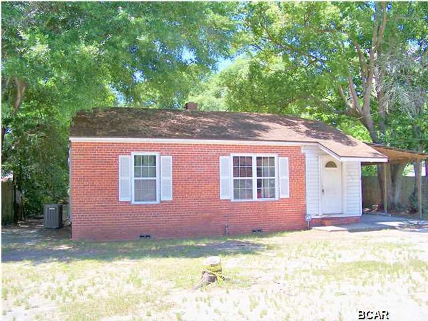 A must see investment property located in the heart of historical St. Andrews. The property is within walking distance of Oakland Terrace Park, Lake Caroline and St. Andrews Marina. Just a short drive away, you will find the Bay County Library and Bay County Government Center, as well as shopping and dining and entertainment. The home is a two bedroom one bath brick home, with a huge screened porch that looks over the shady completely fenced back yard. There is also covered parking and a cute little building which houses your washer and dryer and is great for storing all your toys. Don't delay in making your appointment to see this Fannie Mae Homepath property today. All measurements, sizes and ages are approximate, please verify if important.