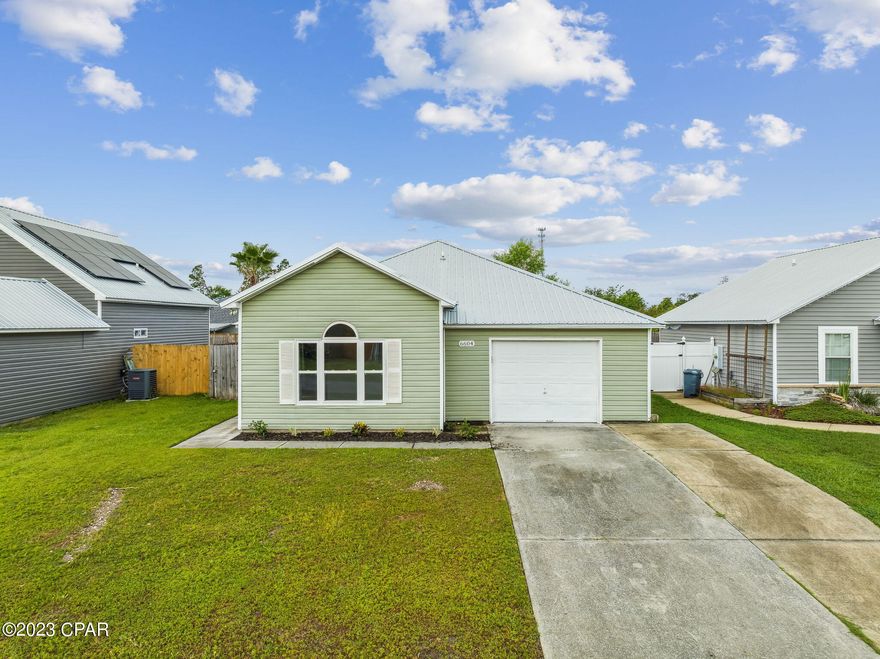 CURRENTLY UNDER CONTRACT, SELLER WILL CONSIDER BACKUP OFFERS
This beautiful 3 bedroom, 2 bathroom home offers comfortable and modern living with recent updates completed from February to May 2023. The home boasts an updated kitchen with fresh paint on the cabinets, new doors, and door pulls. The Peel & Stick flooring compliments the new appliances such as refrigerator, stove, dishwasher, and hood. The sink has been replaced, along with the garbage disposal, and the fluorescent light has been removed as well. Additionally, all three bedrooms come with new ceiling fans and door knobs.

The bathrooms have also undergone upgrades with new vanity light fixtures, new hardware, and painted bathroom cabinets with new doors and door pulls. The entryway and hallway have new light fixtures, and smoke detector, which will be good for 10 years and require no battery changes.

Throughout the entire house, the paint and crown molding have been updated. The house features a new ceiling fan in the living room and fresh paint on the A/C vents. The front door and garage door have new deadbolts with new keys, and the garage has a new light fixture with LED lights. The house numbers and plants were added on May 12, 2023. 

The house offers laminate cherry wood flooring throughout, with no carpet, installed in 2012, when a brand new air conditioning unit was also installed. The metal roof was put in place in January 2019, and in March of that same year, a new fence was erected after Hurricane Michael. In June 2019, all of the doors and windows were updated to hurricane standards, and the water heater was replaced in February 2023. 

This home is a must-see, move-in ready property with plenty of upgrades to make everyday life comfortable and enjoyable. This beautiful 3 bedroom, 2 bathroom home offers comfortable and modern living with recent updates completed from February to May 2023. The home boasts an updated kitchen with fresh paint on the cabinets, new doors, and door pulls. The Peel & Stick flooring compliments the new appliances such as refrigerator, stove, dishwasher, and hood. The sink has been replaced, along with the garbage disposal. Additionally, all three bedrooms come with new ceiling fans and door knobs.

The bathrooms have also undergone upgrades with new vanity light fixtures, new hardware, and painted bathroom cabinets with new doors and door pulls. The entryway and hallway have new light fixtures, and smoke detectors, which will be good for 10 years and require no battery changes.

Throughout the entire house, the paint and crown molding have been updated. The house features a new ceiling fan in the living room. The front door and garage door have new deadbolts with new keys, and the garage has a new light fixture with LED lights. The house numbers and plants were added on May 12, 2023. 

The house offers laminate cherry wood flooring throughout. The metal roof was put in place in January 2019, and in March of that same year, a new fence was erected after Hurricane Michael. In June 2019, all of the doors and windows were updated to hurricane standards, and the water heater was replaced in February 2023. 

This home is a must-see, move-in ready property with plenty of upgrades to make everyday life comfortable and enjoyable.