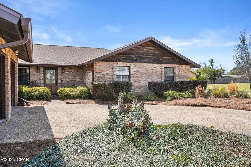 CURRENTLY UNDER CONTRACT, SELLER WILL CONSIDER BACKUP OFFERS
Welcome to this stunning 3-bedroom, 2.5-bath ranch home offering 2,200 heated and cooled sq. ft.  with a DETACHED GUEST HOUSE—a perfect blend of classic charm and modern convenience. Located in Parker, close to Tyndall Air Force Base, this unique property offers unmatched versatility, comfort, and convenience. Situated on a beautifully landscaped lot, this home features a 2-car attached garage with extra parking, a WHOLE HOUSE GENERATOR, and an additional 960 sq. ft. guest house with over 500+ sq. ft. of heated and cooled living space, complete with its own garage, driveway, and rental potential!

Enjoy outdoor living at its finest with a LARGE screened-in back patio with accesses from the living room, dining room, and master bedroom, a bricked open patio, and a spacious backyard—perfect for entertaining or even adding a pool! Don't be fooled by its age—this home offers all the modern features and space of a new build, with the timeless charm of an older home. Step inside to a spacious living area with a 13ft beamed ceiling, and a charming wood-burning stove fireplace, ideal for cozy nights and lots of recessed lighting. The large dining room is perfect for family gatherings, while the gourmet kitchen boasts gorgeous granite countertops, an island bar, a gas range, abundant counter space, a trash compactor, custom cabinetry, a large pantry and MORE—a dream for any home chef. Adjacent to the kitchen, you'll find a HUGE laundry room/butler's pantry area with a half bath conveniently connecting to the garage. Storage is not an issue in this home. These are not your typical bedrooms. Every room offers ample space sure to accommodate your needs. The GRAND master features a LARGE WALK IN CLOSET and an ensuite bathroom with a gorgeous walk in tiled shower, water closet, and a GIANT, granite top, double sink, vanity with a built in bench area that is sure to steal the heart of any beauty enthusiast. 

The Guest House offers loads of possibilities. It can be used as a home office and a guest house, or a rental. 

Note: The 2,200 sqft does not include the 500+ sqft guest house living space. 

 Don't miss this GREAT OPPORTUNITY—schedule your private tour today!