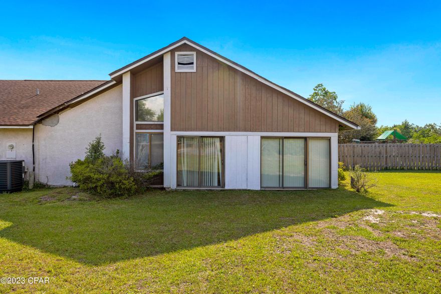 WELCOME to Lakeview Village and the best location in the Panhandle. This end unit townhome gives you the privacy and peace you deserve. Owning this home allows you to have the serenity of country living while being close to all the fun and excitement of Beautiful Panama City and Panama City Beach. Drink your coffee while watching some of Florida's indigenous wildlife in the distance then with a short drive, dip your toes into the Emerald Green Waters of Panama City Beach. Enjoy the Sugar White Sands, then have lunch at one of Florida's Signature Restaurants like Margaritaville or Captain Anderson's Dockside Dining. This home is nestled in The Sandy Creek Ranch & Country Club. Just Minutes from Tyndall Air Force Base, Eastern Shipyard and Mexico Beach. Drive a little further and experience the Marianna Caverns, Several State Parks, Cool Deep Water Crystal Clear Springs and some of the best fishing on the planet. This home is move in ready or can be purchased as an investment property. The interior has new paint and flooring with a good size walk in closet in the master along with a personal vanity just outside the master bath. Come and see for yourself how comfortable you will feel when you walk in to this 3/2.