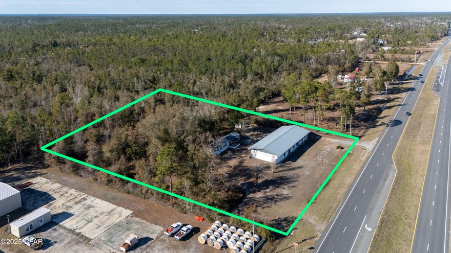 Great property located on Hwy 231 in Fountain area of Bay County with 258 front feet on Hwy231 and 309ft deep. 4558sqft warehouse and 1216 sqft, 3 bed, 2 bath single wide mobile home on approx 2 acres of commercial C-3 zoned land. Property has water well with water treatment system and two septic tanks. Metal roofs on warehouse and mobile home. HVAC in mobile home less than a year old. Only mobile home is airconditioned. Buyer to verify all information.