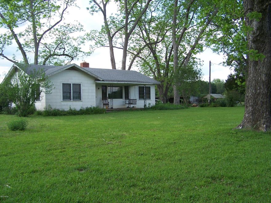 INCREDIBLE FARM OPPORTUNITY! THIS IS A 60.14 ACRE TRACT, THAT OFFERS MULTIPLE OPTIONS. THIS PIECE IS EQUIPPED WITH A 2 BEDROOM 1 BATH HOME THAT BOASTS HARDWOOD FLOORS, TONGUE AND GROOVE WALLS, A GORGEOUS FIREPLACE, AND PLENTY OF UPDATES. IT ALSO HAS A 20'x66' EQUIPMENT BARN! THIS PROPERTY ALREADY HAS A SIZABLE AMOUNT OF MATURE PINES, OVER 280 BLUEBERRY BUSHES, AND GORGEOUS OPEN PASTURES! THE POSSIBILITIES ARE ENDLESS FOR A BARGAIN LIKE THIS. SCHEDULE YOUR VIEWING APPOINTMENT TODAY!