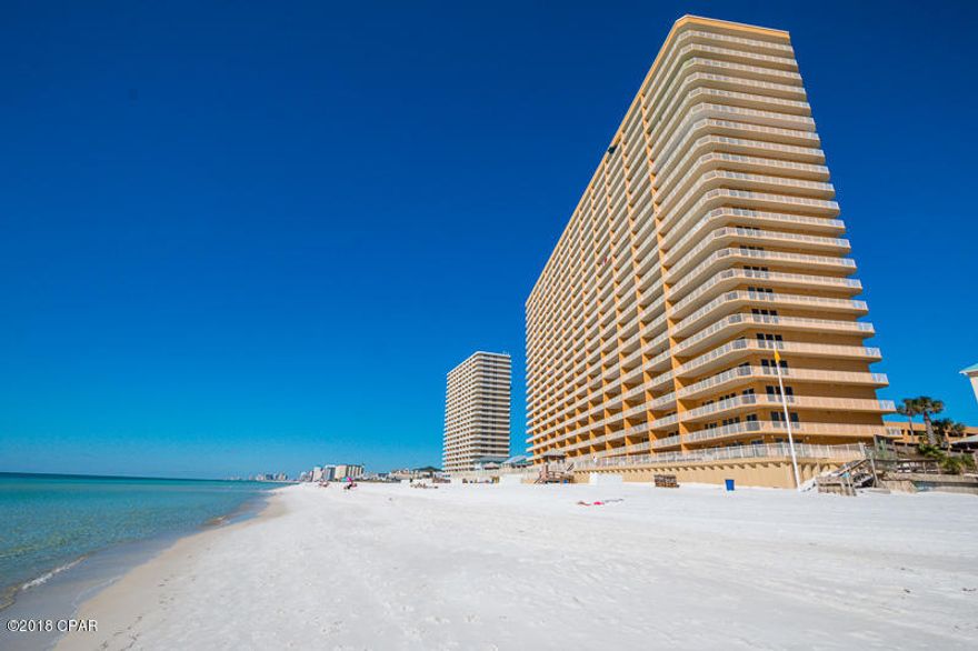 No doubt about it! This is the best deal available in the very popular complex Treasure Island. This 3/2 end unit has one of the (if not the) biggest wrap-around balconies you'll find overlooking the beautiful sugar sand of Panama City Beach. The owner spared no expense with the upgrades and furniture throughout this truly amazing condo. If you're looking for luxury living at its finest than look no further because you've found it right here. This move-in ready unit is truly indescribable. Call today if you're ready to enjoy all that Treasure Island has to offer!