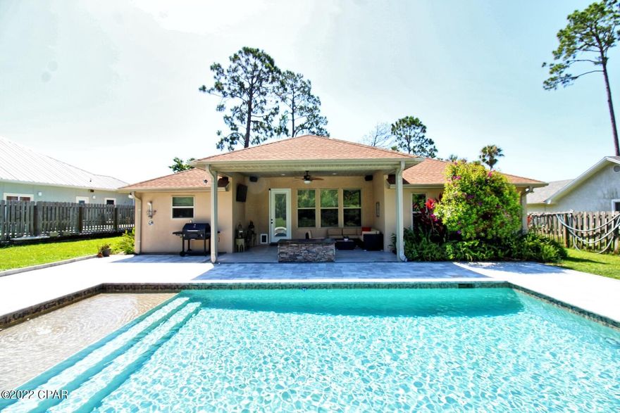 Entertainer's Dream!!!  Here is Your Chance To Own Pool Home in The Highly Sought After Community of Bay Point!  This 4 Bed/ 2 Bath Open Floor Plan Pool Home Features One of the Larger Lots in Bay Point, Inground Pool, 2 Car Garage With Large Driveway, Trey Ceiling In Master Bedroom, High Ceilings, Stylish Rustic Concrete Floors, Brand New Wood Laminate Floors in Bedrooms, Completely Remodeled Bathroom With Sleek Tile Shower, Master Bedroom Located on Opposite Side of House Than Other Bedrooms, Stainless Steel Kitchen Appliances And Much More!