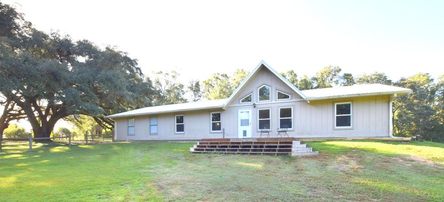 This newly renovated 2-bedroom home is nestled amongst the matured southern oaks and is awaiting its new owners. Inside you will find an eat in kitchen with new cabinetry and Quartz countertops, laundry room with walk-in pantry, large living room with cathedral ceilings and 2 oversized master suites with an abundance of closet space. Other recent renovations include new HVAC, energy efficient windows, tile flooring, sheetrock, fresh paint plumbing and electrical upgrades. Outside you will find an attached 2 car garage, rear screened in porch, fenced front and back yard, detached storage shed and recently installed metal roof. Home is secluded on 2.5 well maintained acres just minutes from Hwy 77 and a short drive to Chipley and Graceville.
