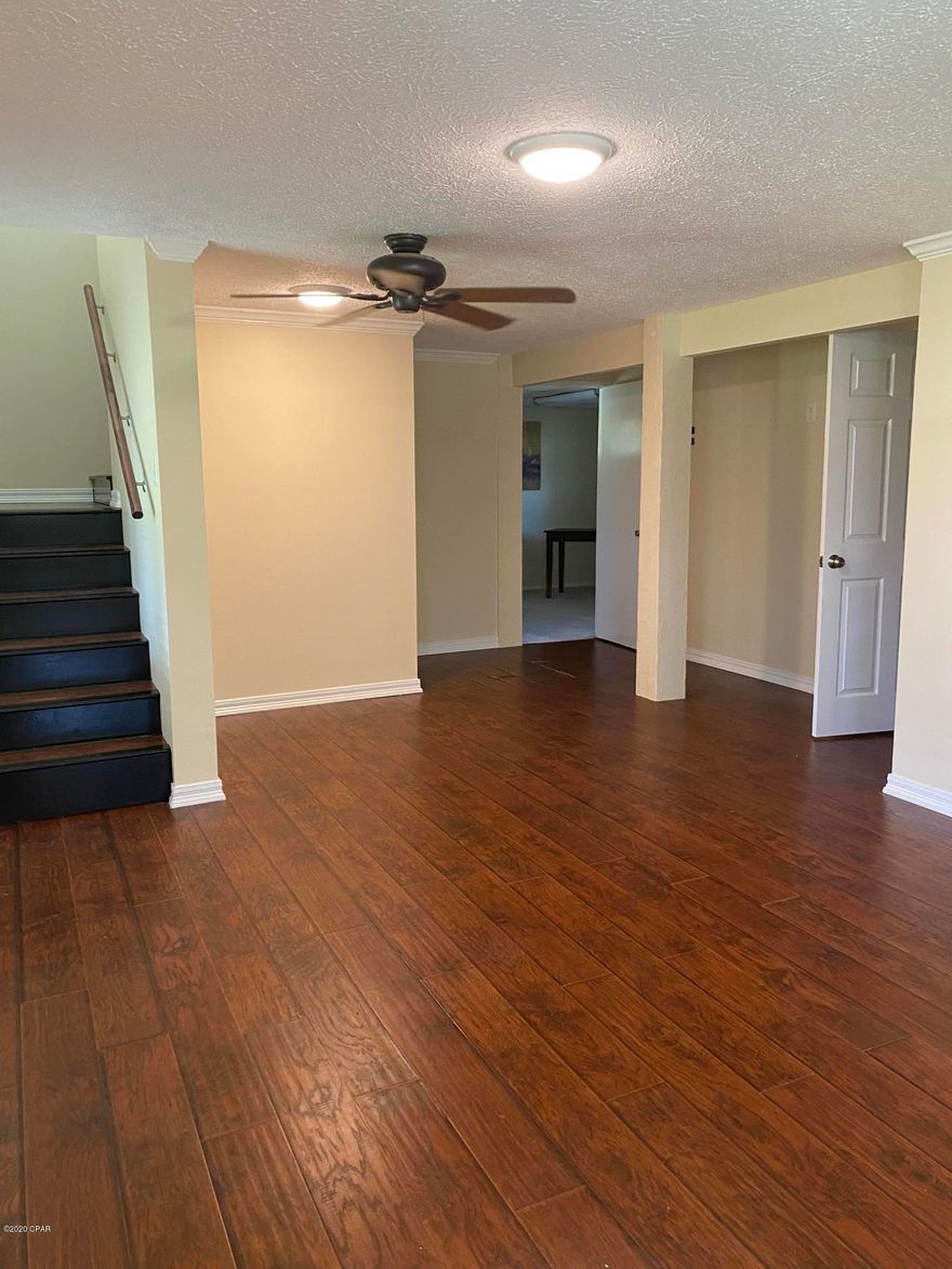 Bring your horses, farm equipment and/or hobbies to this fantastic 6 acre property!  As you walk through the double front door on the first level, you'll come into a large living room, an extra room that could be used as an office or 4th bedroom, bathroom & laundry room.  Upstairs, is the kitchen with granite counter tops, custom hickory cabinets, butcher block countertop bar & gorgeous antique pantry door.  Also on the 2nd level is the dining room, 3 bedrooms & 2 baths & crown molding throughout.  Relax in the evenings on the covered front porch either upstairs or downstairs.  New appliances, new carpet, new interior paint, & renovated upstairs bathroom.  Additional craft room with separate entrance downstairs. 2 large pole barns are located on the NW side of the property with a separate entrance and provide plenty of room for your toys and farm equipment.   The 1st pole barn includes two large office spaces/rooms with kitchenette area, covered breezeway, & covered storage along with a half bath.  The 2nd pole barn, which is covered on three sides, includes 10 bays to store your equipment.  Metal Roof and HVACs in both the house and offices are only 3 years old.  Property is zoned residential rural (R2).