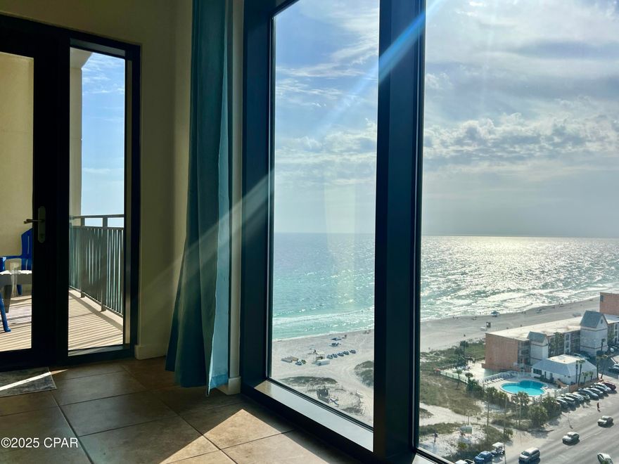 Is this the one?  An amazing 1 bed 1 bath condo at the beautiful Origin resort.  Totaling 881 square feet with stunning Gulf and sunset views!  The sellers are motivated to move this unit to a new owner!  As you enter, you can't help but to notice the beautiful west facing views of the beach, Pier Park, and the Front Beach strip.  Unit 1407 comes fully furnished, and is ready to move into or rent right away.  The large kitchen is fully equipped, and the huge living room has plenty of room for all your guests.  No carpet in the entire unit, ceramic tile throughout!  The balcony offers incredible beach and Gulf views, complete with nightly sunsets!  Whether you're looking to make this condo a primary residence, a personal vacation destination, you can travel stress free without a car and walk to some of the area's best restaurants and night life.  The renowned Sharky's beachfront bar and grill is just across the street, and Pier Park is less than a mile away.  Origin offers many amenities including two BBQ grill/picnic areas, a heated pool, hot tub, theater, game room, laundry facility, vending, a gated community with 24-hour security, and retail on site including Starbucks coffee, convenient store and grill, and Sunsations beach store. Origin is also one of the only condos on the beach that offers interior corridors that will keep you feeling safe and secure.  If you're looking to add your investment portfolio, or you're ready to make the world's most beautiful beach your primary (or vacation) residence, call me anytime to schedule your private showing of this amazing condo and the incredible Origin resort.