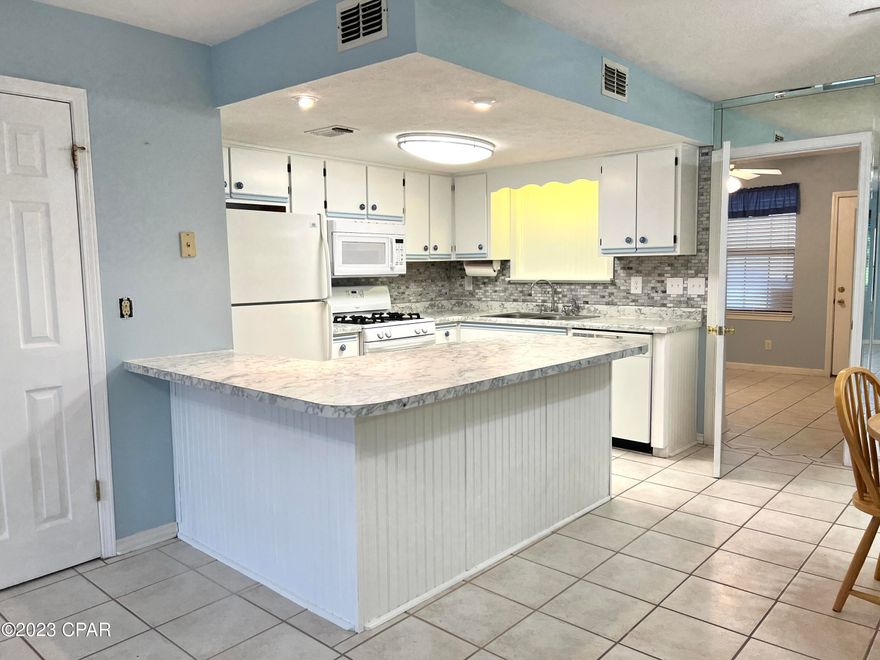 UNDER CONTRACT- SELLER WILL CONSIDER TAKING BACK UP OFFERS-----Rare, 3B/ plus 1 Bonus room and 2.5 Bath Townhome. This 1,332 sq ft. is Located on the main street in this Gated community of Gulf Highlands Beach Resort. The unit is centrally located to all of the amenities on the property and is close to the ''overflow parking and Beach access. This is a clean unit that comes unfurnished (Check Attachment #2 for items that convey). The sellers have added extra storage closets in the up and downstairs areas plus an outside pull down storage in the ceiling of the back patio, which is great when living full time or making those spaces ''owner's storage areas'' for rentals.  All of the expense of adding on to the unit have been done for you, so all you have to do is decorate it the way you would like and enjoy! Upstairs, you have the 2 Bedrooms, 1 Bonus Room, 2 Full Baths. Downstairs there is 1 Bedroom off the kitchen with a nice size closet and a laundry room inside. This room can be used for anything.  There is also a half bath located near the living room. It would be very easy to even put in a Shower/sink in the Bonus Room to add even more to the unit's value. Gulf Highland owners are allowed to have short & long-term rentals, they can own a golf cart, have pets (see Rules & Regs to answer your questions), and the two parking spots in front of your unit are deeded to you. This resort is a unique property indeed, with 11 pools (5 heated), Tennis/pickle ball courts (4 courts), 18 Hole Mini Golf area, Picnic tables, Golf cart parking areas, Convention Center room, Playground areas, Restrooms, Exercise room, A Private Beach House with a cafe, pool and upper deck (construction updates are almost completed) and the beach area has outdoor rinse off showers and bathrooms, so you won't have to go far to eat or use the restroom... just have fun at the beach or pool. There is even a golf cart parking area right across from the Beach/ Beach House, so you don't even have to carry all of your beach gear back. Gulf Highlands has a low HOA of $948.82 per quarter and has always been a very sought after place to live and vacation. 
Please verify  SF, and dimensions if important.