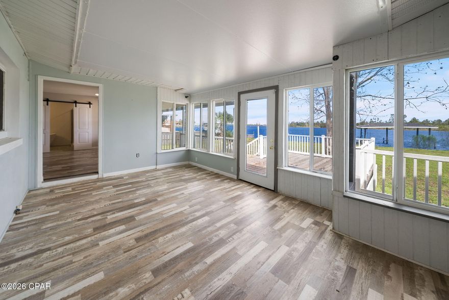 Here's your chance to own a waterfront spread!  This property consists of a 4-bedroom , 3-bath MAIN house, PLUS a 2-bedroom, 1-bath 600 SF apartment, great for use as a mother-in-law suite, teen suite or perfect for visiting family or endless opportunities.   The entire rear of the Main House is covered in glass, affording great views of Anderson Bayou and the 40' covered boat slip.   Inside, Luxury Vinyl Plank covers all the floors; Granite adorns the kitchen and baths and the living room pops with a brick wall accents and a wood burning stove/fireplace.  This is a great locale, only 5-10 minutes to grocery, shopping, restaurants and schools, and the Gulf of Mexico and beaches are 40 minutes by boat or 25 minutes by car.  (All info is presumed correct, Buyer to verify any and all info that is important. Some images are virtually staged)