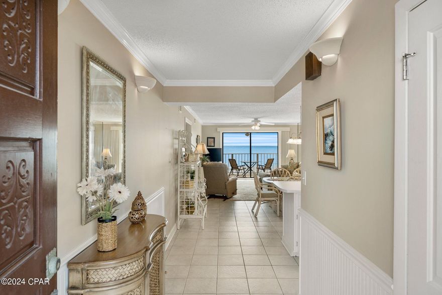 CURRENTLY UNDER CONTRACT, SELLER WILL CONSIDER BACK UP OFFERS *** Low Floor Alert *** at Regency Towers Condominium. Regency Towers is a favorite vacation destination, known for its location on the beautiful white sand beach of Panama City Beach, and amenities such as two ''Olympic'' sized pools ( one of which is heated ), a kiddie pool, indoor whirlpool spa, poolside/beachside tiki bar serving up food and beverages., fitness center, community room, and various locations to barbecue/grill for a spectacular lunch or dinner in. This two bedroom two bath condo features a gulf front master bedroom with its own private sliding door the covered balcony overlooking the beach and pool, and has been meticulously maintained in excellent condition, as it's used only by the owners, family and friends. This condominium is offered fully furnished ( with exception of the Sellers personal affects/photos ) and has charming coastal details throughout such as the molded shell sinks in both bathrooms and the square tile shower and feature walls that  are currently trending. The unit has a deeper than average covered balcony  ( allowing for sun and shade ) ideally situated over the heated pool and white sand beach. The kitchen is airy, bright and white, featuring a stainless steel refrigerator and dishwasher. The owners updated the electrical panel in 2022 and had the bathtubs reglazed. Please verify room measurements if important to Buyer.