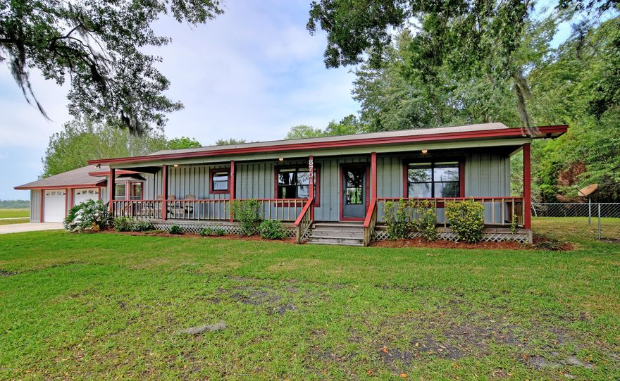 Enjoy the quiet life in this wonderfully kept country home on 4.78 acres with a barn and pasture.  The residence features an 8 foot wide covered front porch, perfect for relaxing & entertaining.  This home features a split plan for privacy between guests and the master suite.  The master closet has an additional ''hidden closet'' with a hideaway for weapons and and room for ball gowns.  The kitchen is open to the main living room with solid wood cabinets & a huge pantry for storage & bulk buying. Bonus room makes the perfect game room or study. The garage is oversize with attic access & room for storage.  Behind the home is a built in above ground chlorine pool (27' diameter 4'deep) in great shape with decks surrounding.  The barn past the pasture has a tack room & four stalls. The Horsebarn and pasture could be rented to create income,barn has been rented for $450/month.
There is a 235 foot well and Culligan water treatment system.  The roof is only 9 years old, plenty of life remaining!  This home has many other features.
Including but not limited to:
Sturdy construction on a monolithic slab
Termite bond through Florida Pest Control
Large coat closet
All stained wood trim
Navco laminate flooring
Linen closets
Tub / Shower combo in hallway bath
Spacious dining room
New hardware in kitchen
Smooth top stove
Side by side refrigerator
Dishwasher & disposal
Tub / Shower with Dual Heads in Master
HVAC is maintained yearly (original to the home)
Laundry room has storage and a laundry sink, broom closet
Master bedroom accesses covered porch and pool area in back.
Sprinkler system in yard
Beautiful red leaf maple turns in the fall
Septic tank regularly treated with RidX
Information is approximate - if important, buyer must verify
