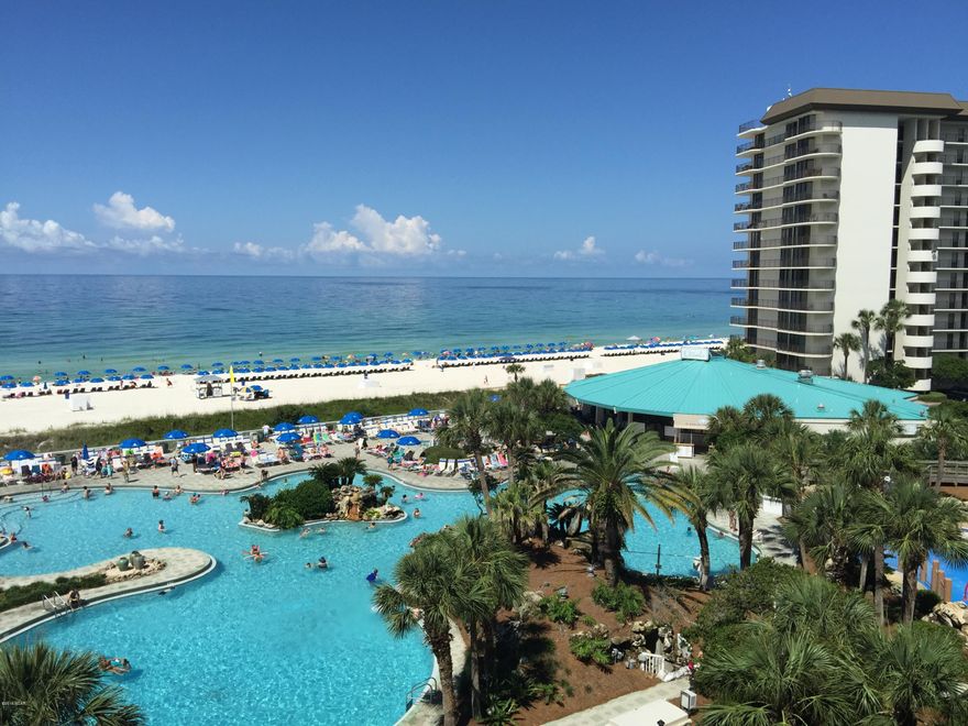 Large Gulf-Front Condo For Sale at Edgewater Beach Resort in Panama City Beach, FL. 4th Floor, right on the sand dunes! Perfect location for Sunset Views. Open and spacious kitchen. Dining with full wall hand painted beach mural. Floor to ceiling windows in living area. Private beach-front balcony. Golf, Pro Shop, Tennis, Basketball, Shuffleboard, Gym, Aerobics/Yoga, Massage. Enjoy the tropical Lagoon Pool or one of the Heated Pools and Hot Tubs. Full Restaurant, Poolside Bar, Market. Kids Club. Tram service. Secure environment with manned, gated entrances. Walkable to shopping center, dining and amusements. Come find your beach, you deserve it!