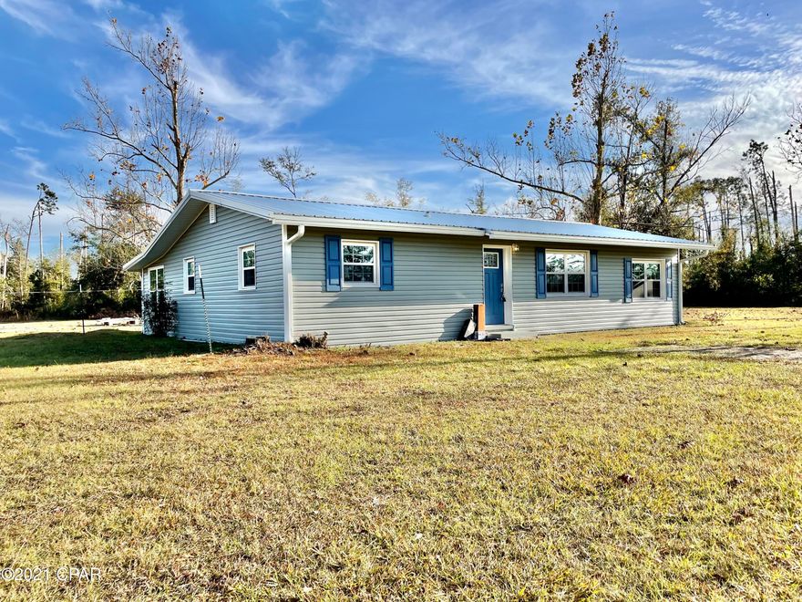 Country living that's less than 20 minutes to the city, minutes to a new elementary school, park and Deer Point lake. This three bedroom two bath home has been completely redone with a new roof, cabinets, appliances, floors and freshly painted walls. The 3.7 acre property is mostly cleared and left wooded in the back part of the property. The zoning is R2 which allows for additional structure/ homes on the property. There is minor punch list work from the improvements to be completed and will be done well before sale.