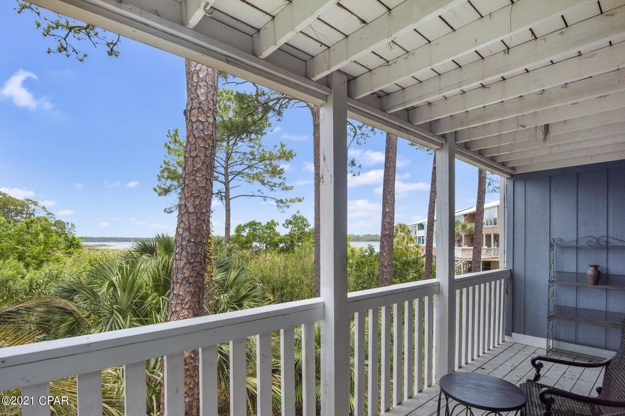 This charming one bedroom condo, overlooking Lake Powell, is every beach and boat lover's dream!  The community of Pirate's Cove boasts two pools, a community dock, and best of all, exclusive access to the beach and gulf from the coastal dune lake by way of a private boat and kayak launch.  Paddle or boat to the beautiful and serene beach at Camp Helen State Park or explore the shoreline of Lake Powell!  This condo is beautifully furnished and has been completely updated with new LPV flooring, countertops, light fixtures, and appliances.  Located just a short drive to the shops & eateries of 30A & 30Avenue, this property is an ideal beach getaway or rental investment.  Live the beach life!