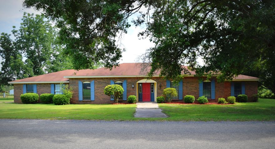 This spacious brick home is conveniently located between Chipley and Graceville just off Hwy 77. Inside features include updated kitchen with breakfast bar that is open to the living room, formal dining room that could serve as a 4th bedroom if needed, office, massive master suite with sunken Jacuzzi tub, large walk-in closet and separate shower. Home has recently received a coat of fresh paint inside and out, new HVAC unit and new drain field. Outside you will find a 2 car garage, storage building, screened porch and landscaping.
