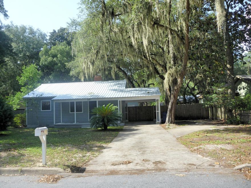 FABULOUS RENOVATION IN THIS QUINTESSENTIAL COVE HOME! Plus a 24x40 cinder block workshop with half bath! New metal roof, exterior and interior paint give this home a fresh new start! The hardwood floors, throughout the home, have been beautifully refinished. The living room has a functional fireplace with the original, hand carved mantel. There is a built-in cabinet, which would be the perfect location for your flat screen TV! The plumbing was replaced and there are new lighting and plumbing fixtures. The original bathroom has new tile flooring and lighting. The MBR is large and has newer hardwood floors and a walk-in closet (a rare find in the older Cove homes!). The MBA has a tile floor, built-in cabinets for lots of storage and a tile counter top. The kit has lots of cabinets and has a ceramic top stove but, is plumbed for gas, if you prefer. Cute little back porch leads to the huge workshop that has a garage door and is complete with exhaust fans, a couple of work benches, laundry room and half bath. The tankless water heater is also located here. There is an extra wide gate taking you to the workshop. Large yard framed with magnificent trees, put this sweet home on your list!