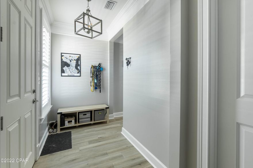 COMPLETELY REMODELED CONDO located in Historic St. Andrews, overlooking St Andrews Bay, has become one of the most sought after residences for those looking for a community where you can walk to the coffee shop in the morning, lunch and dinner, and kayak or fish from your property!  Renovations include new windows and a new sliding glass door.  As you enter this two bedroom, two bathroom 1405 square foot condo (with extra storage room valued up to 10k), you will instantly feel at home.  Beautiful plantation shutters in every bedroom, crown molding and luxury vinyl plank in the main living areas and santorini tile in the master bathroom, you will see that the remodeling was done with first-class finishes.  An open floor plan provides great space for entertaining as the kitchen opens to the dining area and living room.  The sliding glass door in the living room opens to the balcony facing West so you can enjoy fabulous sunsets! Lots of custom cabinets for storage and tons of granite counterspace for food prep in the kitchen.  A split bedroom floor plan gives guests privacy. The master suite has a window seat facing the Bay. The master bathroom has a garden tub, tile shower, dbl vanity and spacious walk-in closet. The laundry room is located in the hallway with a Maytag washer and dryer, that convey.

The front door of the condo overlooks the condominium's private park with a pavillion complete with a fireplace, tables and grill. Oaks by the Bay is the public park just East of the condominium's and is accessible from the condo's private green space. 
Harbour Village is a gated community with covered parking garage, private dock, fitness center, pool, community room and you're walking distance to all the boutiques and restaurants in historic St. Andrews and you'd have a front row seat to all the year-round events.  Age, sq ft, rm sizes are estimates. please measure if concerned.