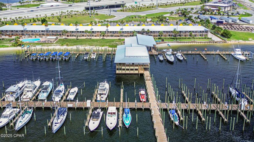 CURRENTLY UNDER CONTRACT, SELLER WILL CONSIDER BACKUP OFFERS. 

This 1-bedroom condo is the best-value ground-level unit currently for sale in Sun Harbor, offering unobstructed water views right from your covered porch. Vacant and ready for immediate move-in, it delivers comfort, convenience, and true waterfront living.

Perfectly situated just minutes from the sugar-sand beaches of Panama City Beach—yet still within the heart of Panama City—Sun Harbor offers the ideal blend of coastal access and in-town convenience. The community's full-service marina features over 120 deep-water slips, a fuel dock, and both transient and long-term dockage. From your doorstep, you can set out on dolphin tours, fishing charters, or leisurely boat days. A new marina-front restaurant is also expected to open by the end of 2025.

Residents benefit from enjoying the inviting in-ground community pool, and a close-knit community. The on-site marina store is stocked with snacks, beverages (including beer and wine), sunscreen, life jackets, cleaning supplies, tackle gear, rods, reels, and more—making it easy to grab what you need without leaving home.