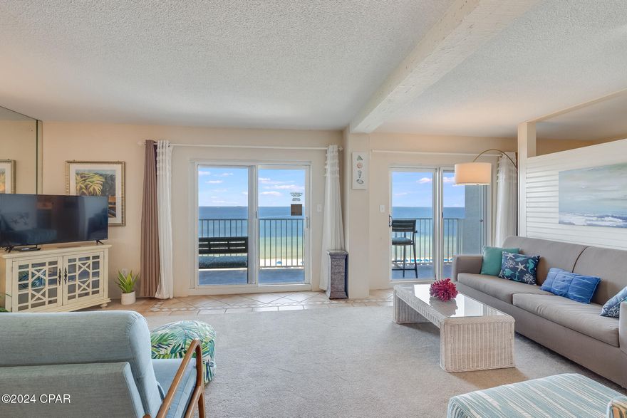 Bundled service pricing available for buyers. Connect with the listing agent for details. Experience beachfront luxury at Moonspinner Condominiums on the tranquil east end of Panama City Beach. This unit, 2-bedroom with bunkroom, 3-bath with enhanced living area for a more spacious feel. The living room features two double glass doors, offering stunning Gulf views and leading to a beautiful balcony. 

The expansive primary suite also overlooks the Gulf and includes a private balcony for serene enjoyment. The guest bedroom is generously sized, comfortably fitting two queen beds and includes a walk-in closet. The kitchen boasts quartz countertops, and deep stainless steel sink.

Moonspinner Condominiums are ideally situated next to St. Andrews State Park, perfect for morning strolls along pristine beaches and dunes. The quiet east end location offers proximity to excellent restaurants, many within walking distance.

Amenities at Moonspinner include two pools, a newly renovated pool house, hot tub, tennis and pickleball courts, kayak racks, a boardwalk, beachside showers, ample parking, 24-hour security, and onsite maintenance. Recently, the complex has undergone extensive exterior renovations and completed its Milestone Inspection. Moonspinner accommodates both full-time residents and short-term rentals (7 day minimum), providing flexibility for all lifestyles.