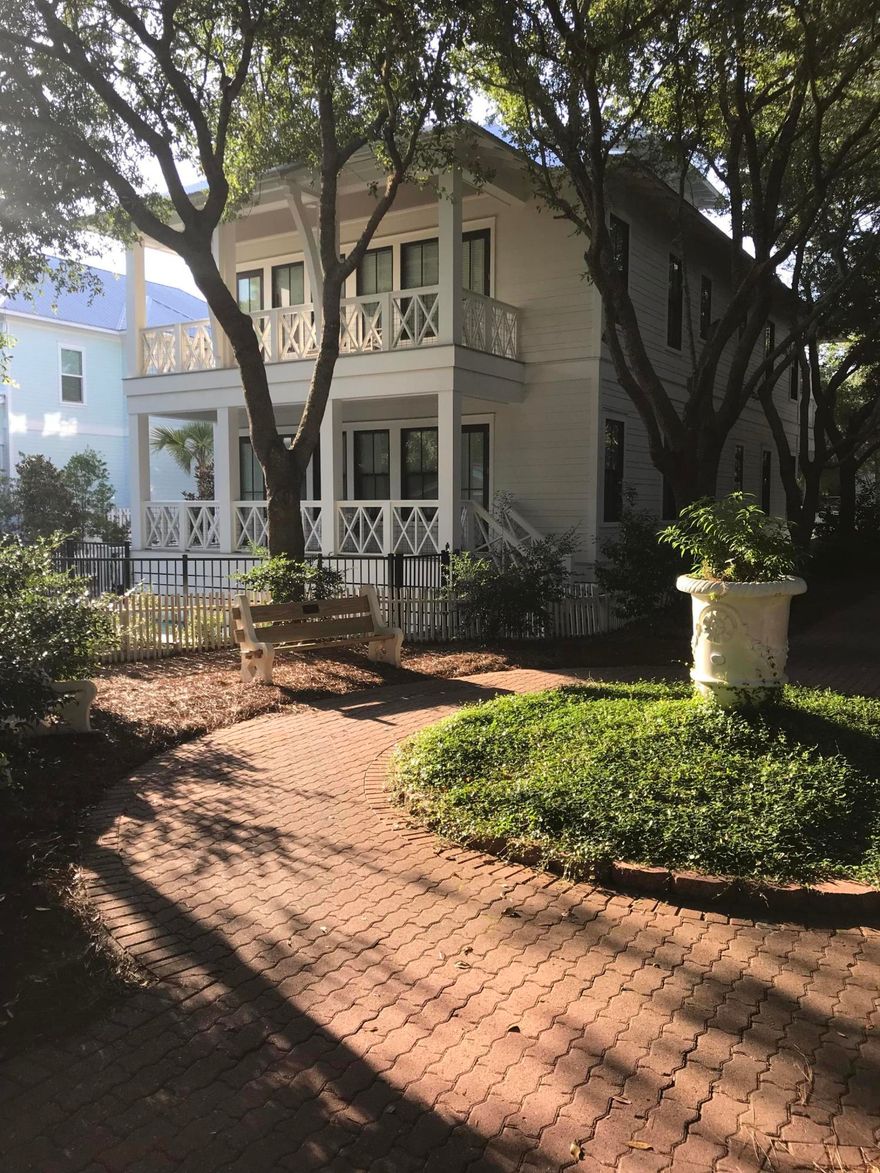 This spectacular 5 bedroom, 4.5 bath new construction home, built by Hemingway Construction, comes complete with the southern charm of double loaded front and back porches for you to relax and enjoy the community!  This exquisite home has some extraordinary features, which include a private in-ground, heated pool inside the beautifully fenced backyard, striking marble counter tops, a custom wine bar, a massive kitchen island and upgraded finishes that include high end appliances, light fixtures and a dazzling glass tile backsplash.  This home consists of nickel lap walls, gorgeous wide plank, washed oak flooring throughout the main areas, a hand-made pecky cypress barn door and built in bunks!  There is a master bedroom and a second living space on the first floor, two master bedrooms on the second floor and a spiral staircase that leads to the third floor play area!  This house was professionally decorated by Joy Le Blanc and is being sold with a lavish $75K furniture package.  Not only is this a stunning house, but it is located in a park like setting next to the tree lined promenade which leads to the Bellview Community Pool, Tennis and Basketball Courts, Playground, Lake Carillon and the downtown area.  And if that's not enough, there are 8 walk overs in the Carillon Beach community where you will find 4,000 linear feet of uncrowded pristine sugar sand beaches!