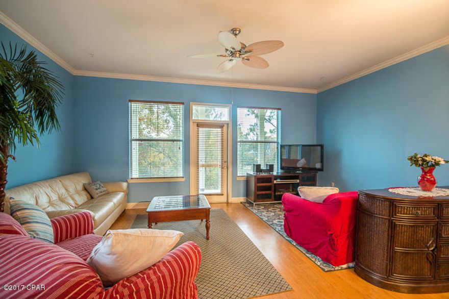 Financing now available! Paradise at an affordable price! This professionally built spacious 1 bedroom / 1.5 bath condo in a gated community is turn-key and ready for your offer. This open floor plan boasts over 1,500 sqft providing plenty of room for comfortable living and a vast amount of storage. The first floor has beautiful wood floors in the great room which has its own balcony and plenty of windows to allow natural light to flow throughout. Become a master chef in this gorgeous kitchen with granite countertops, stainless steel appliances, tile back splash, lovely tile floors and a large breakfast bar. Upstairs the master bedroom includes a private balcony and a private master bathroom with a double vanity, tiled shower, large garden tub, and huge his/hers walk in closets. The HOA amenities include a gorgeous pool, Business center, Community room, Gym, Game room, and Recreational facility. Other features included in the HOA are Insurance, Trash, Ground keeping, Security, Maintenance/Repairs, Pest control and Water. Island Reserve is a private community and conveniently located close to Schools, Shopping, Restaurants and Entertainment. Schedule your showing today, you don't want to miss out on this beautiful corner unit!