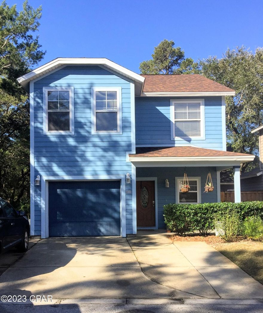 Charming craftsman style home located in The Plantation at Santa Rosa offers plenty of peace and quiet due to being located at the end of a cul-de-sac and having an undeveloped lot as a neighbor. As you enter the home you are greeted by a large kitchen with plenty of prep space on the solid surface counters and ample storage in the abundance of cabinets. The counter-height eat-in bar divides the kitchen from the open dining and living areas. In addition to all the entertainment spaces downstairs you'll find a half bath, generous laundry room, and abundant storage under the stairs. Upstairs you'll find all three bedrooms and 2 additional baths. The generously sized primary suite offers its own private bathroom with a separate stand-up shower and soaking tub.

The additional two bedrooms access the same bathroom with shower and tub combo. This home comes with a single car garage, three parking spaces in the driveway and one available street parking spot. The back yard is accessible from the living room and features a covered porch and fully privacy fenced area perfect for kids or pets to play. The community offers large pool for its residents and is a non-short-term rental community meaning it is perfect for those looking to live at the beach and gain a sense of community with their neighbors. Located north of Highway 98, The Plantation in Santa Rosa is just a short drive to 30A, beach accesses, Grand Boulevard, and local restaurants and shopping. This home is perfect for young professionals, small families, investors looking to house-hack their way to ownership by utilizing roommates, frequent visitors to 30A looking for a personal 2nd home, or even real estate investors looking to add a long-term rental to their portfolio to reap long-term appreciation gains. * New roof in 2018 * All information is deemed reliable but important measurements to be verified by the buyer.