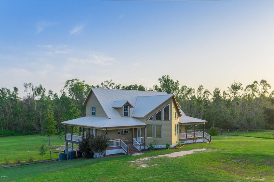 Gorgeous cabin style 3/3 on 6+ acres with an amazing wrap around porch and HUGE basement two car garage. Master bedroom is on the first floor and the two additional bedrooms have their own full baths attached! The living area is beautifully open with huge windows letting in gorgeous natural light. Sit on the back porch swing with a view of your own pond and enjoy incredible serenity. Make an appointment to see this beauty today!