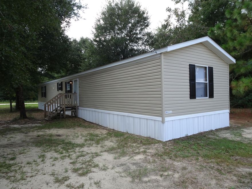 Mossy Head Area. Spacious 3/2 on large corner lot. Recently Updated and in Move In Condition. Priced at 59,900 w/ several financing options available including FHA and Possible Seller Financing with all credit situations considered! Contact agent for complete details and ask about the easy application process.