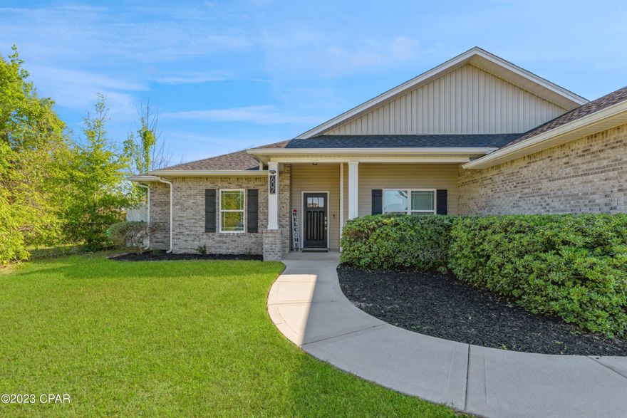 Beautiful, desirable, Lynn Haven has a new property on the market that won't last long!  This spacious 4 bedroom 2 bath home is move in ready! No HOA's!  The open floor plan and centrally located kitchen is perfect for entertaining and dining! Granite countertops throughout kitchen and bathrooms. Split floorplan! Large, fenced, back yard! Coffered walls, LVP flooring, and lovely tray ceilings add a timeless touch of style to this well maintained home! Schedule a showing now!