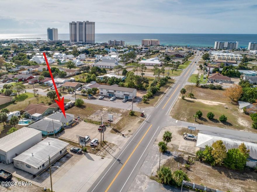 Fantastic Commercial! Close to Pier Park and just a few blocks to the Emerald Beaches. Updates include newer floors and bathrooms. Additional features include restaurant equipment, tables, chairs and furnishings. Owner would consider renting unfurnished. The adjacent property is also for rent, so you could combine both properties for a larger building. Property includes land (front and back) and a shared parking lot, size 36x120. Building is on city sewer and water. Lots of potential uses! Call today to schedule your showing. All measurements approximate, please verify if important.