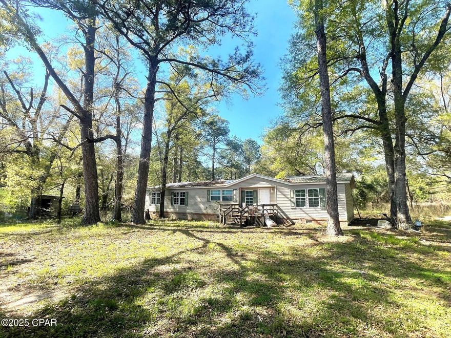FIXER UPPER!
2 MOBLE HOMES JOINED TOGETHER TO MAKE A 7 br/4b HOME SITTING ON 3 ACRES.
The home is in need of repair and being sold as is. Electricity is on.