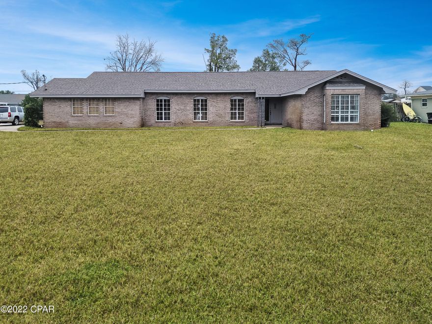 This home is located in the prestigious Kings Point neighborhood with easy access to Panama City, Lynn Haven, Tyndall and the beaches. Home has 3 bedrooms and 3 full baths. A large wood burning brick fireplace accents the family room. The spacious Master bedroom features two closets and bay windows. The home sits on an oversized .5 acre fully fenced lot. Plenty of room for kids, pets or future pool. Garage includes a large built-in workbench with overhead storage. All new stainless steel kitchen appliances 2019. New roof installed in February 2019. This home is an outstanding value in this exclusive neighborhood and will sell quickly.