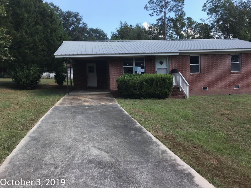 Brick home near everything in Bonifay.  The home has 3 bedrooms, 1 bath, a living room, large eat in kitchen and a sun room.  The back yard is large with a storage shed for additional storage and there is also a carport.   The home was built in 1975 so there is a potential for lead based paint, disclosures will be provided. This property is being sold AS IS. The buyer has a 7 day inspection period which starts once you receive the ratified contract.  NO REPAIRS or PRICE ADJUSTMENT will be considered based upon inspection reports and/ or appraisal. Buyer is responsible for their own title policy and seller recommends the buyer obtain title insurance.  Prior to seller receipt and approval of the full title package from foreclosure, title to the property will be conveyed by a quit claim deed.