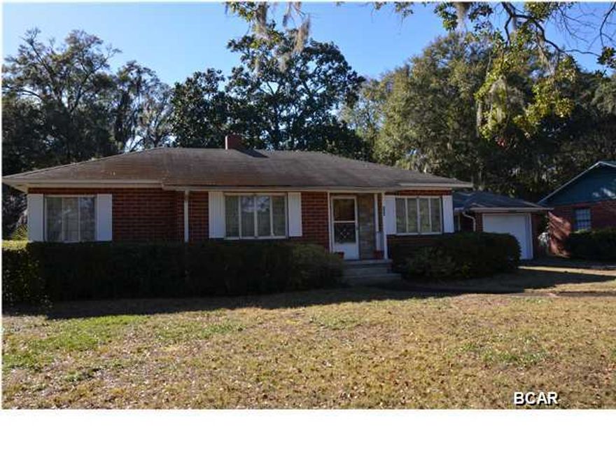 Immaculate home in the heart of the Cove. This brick, 3 BR/1BA home with over 1,300 S.F. sits on a large 100x140 ft. lot with rear access from the alley way behind the home. This home features a formal living room and den, galley style and eat in kitchen, and a separate dining room. There is a deep well for the yard, storage building with electricity, and all appliances can stay with the home.