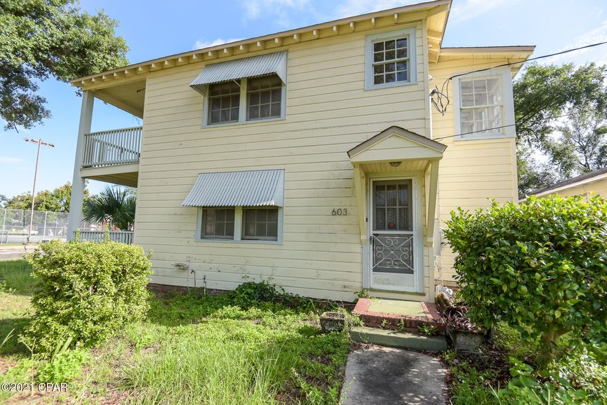 CHARMING Duplex in the COVE! This is the UPSTAIRS unit, featuring refinished hardwood floors and a patio. This duplex also comes with a shared garage that is detached from the homes. GREAT location, with a short drive to 23rd, Hwy 77 and all the downtown amenities! More photos coming soon! DON'T miss out, CALL TODAY!