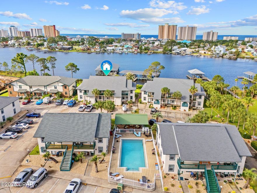 Priced for condition. GREAT Opportunity for those who love the water. Right on the Lagoon with the BEST VIEW! Windows Galore! 5 minute golf cart ride to the most beautiful white sandy beach. One of the largest floor-plans in the community that also offers a community pool and covered picnic grilling area. If you want to live waterfront this is your chance.
**NO boat-slip included or owned by the seller.**