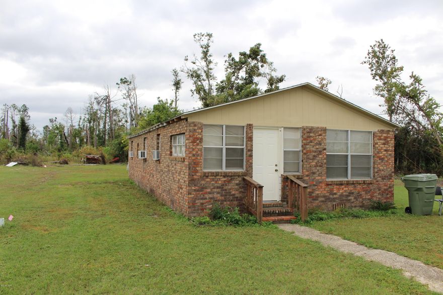 Brick home located very conveniently located just off Hwy 77, 836 sq feet but offers three bedrooms with window air conditioning in each room. Washer & Dryer Connections in laundry room. 

0.33 Acre Lot