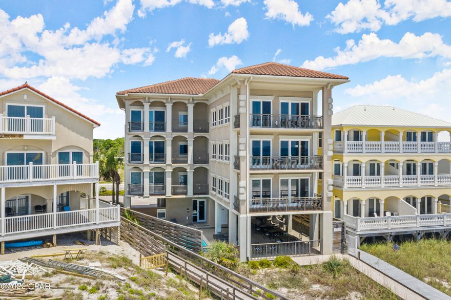 GREAT RENTAL INVESTMENT PROPERTY WITH 3-SEPARATE CONDOS in the building. Each condo has 4 bedrooms, 4.5 baths per unit with approximately 2500 SF living space and two private balconies. Gourmet kitchen with custom wood cabinets, granite counter tops, stainless appliances, breakfast bar, wet bar with sink and wine storage. Upgraded finishes throughout with gulf front balconies and gulf water views from most rooms. Whirlpool tubs at master baths overlooking the gulf. Beautiful tile floors with decorative rugs and comes lavishly furnished. Ground floor has private guest with bathroom and shower, beach access, storage and amble parking. Highest quality concrete construction with metal studs, tile roof, and stucco exterior. NO HOA FEES and GROSS RENTAL PROJECTIONS OF $435K