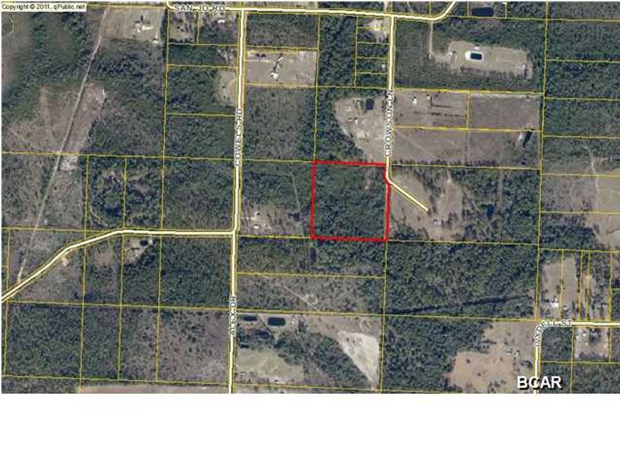 Get away from the city!! Quiet secluded 10 acre lot on dead end road close to hwy 231 and Hwy 20. approx. 30 minutes to Panama City. A small arm of Bear Creek runs through back of property according to survey.  Front portion of property was partially cleared and graded in 2005 and fill dirt was added, but has since started to get overgrown.  All measurements are approximate and should be verified

if important. 2003 survey is available.