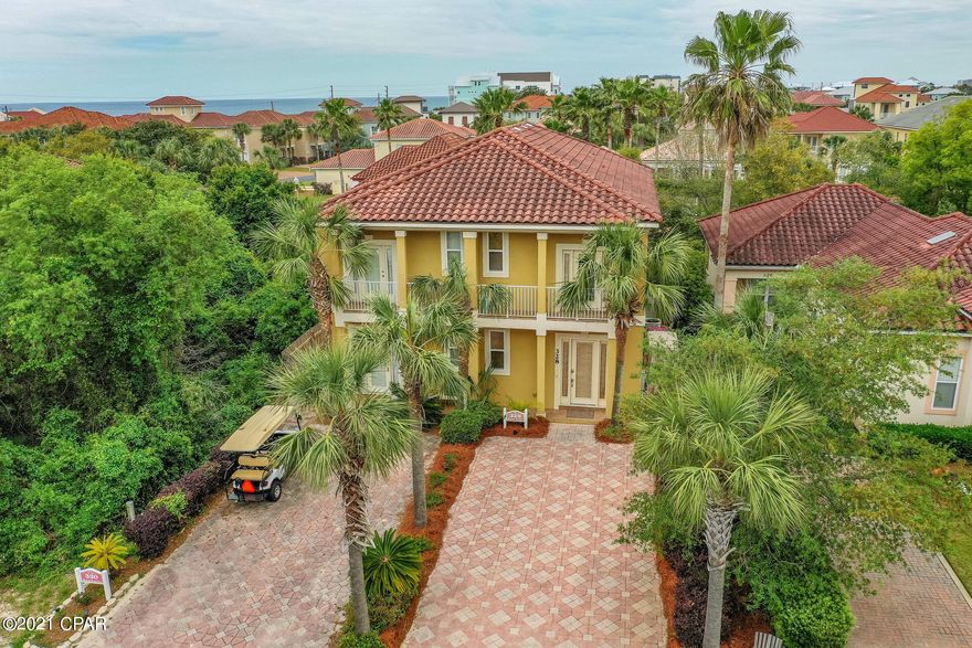 'CURRENTLY UNDER CONTRACT, SELLER ACCEPTING BACKUP OFFERS' West End Mediterranean style Luxury Living in a gated community of homes across the street from the beautiful gulf of Mexico! This 3 bedroom, 3 bath, well layed out townhome is sold mostly furnished and has been well maintained. Features of this home include: crown molding, wood and tiled flooring, great room with high ceilings and an open floor plan, breakfast bar and dining area. This luxury home also offers a Master suite with balcony and large guest room both with full size bathrooms upstairs as well as a bedroom and full bath downstairs. Amenities of the community include: dedicated beach access and beach front community pool and pavillion, clubhouse and lighted tennis courts. Call today to see this lovely home