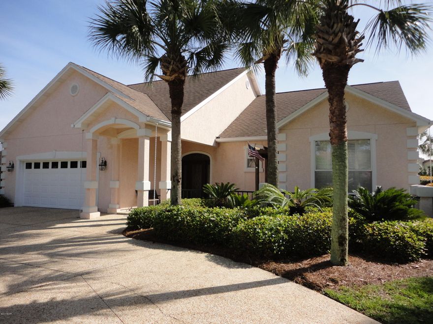 Well cared for one owner Bay Point canal home with 80 feet of gorgeous canal waterfront. Home features open floor plan with living room, dining room, kitchen, breakfast room and master bedroom overlooking  large screened solar heated saltwater pool area and canal. Luxury Master Bedroom Suite with walk-in closet.  Luxury Master Bath with whirlpool tub, separate shower and double sinks. Kitchen has lots of cabinetry and breakfast bar.  Also features 10' ceilings, crown molding, circle drive and elegant landscaping. Make your appointment today!