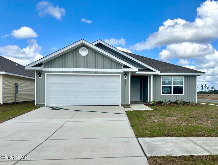 Welcome to the Lismore, a new home floor plan located at Liberty in Panama City, Florida. The Lismore is thoughtfully designed 3-bedroom, 2 bathroom, one-story home with 1.580 square feet of modern living. On the outside of your home, you will see durable vinyl siding, a spacious two-car garage with an opener and a fully sodded yard to the property lines. This home comes equipped with dimensional shingles with a limited lifetime warranty, electronic deadbolts on all exterior doors, weatherproof outlets, and hose bibs. Sidewalks line the neighborhood streets for you to enjoy the beautiful Florida weather at Liberty. Inside you will see 8' ceilings throughout, engineered vinyl plank flooring throughout the home and carpet in the bedrooms. The front bedrooms, bathroom, and garage are close to the front door and welcome you into an open living room and kitchen, perfect for having guests over. Granite countertops, white cabinetry with soft-close are in the kitchen and bathrooms, and the kitchen island make hosting or serving dinner at the bar a breeze. Complete with a pantry, and stainless-steel appliances including smooth top range, microwave, and dishwasher means your kitchen is fully equipped. The living room has plenty of windows for natural lighting and leads right to the back door. Each bedroom comes with soft carpet floors and spacious closets. The Primary Bedroom features a bathroom with a detached shower and double vanity with granite countertops. The walk-in closet is adjacent to the bathroom, meaning more space in your bedroom. As with all the homes in Liberty, your home is outfitted with the latest Smart Home technology allowing you to manage your home right from your phone, making your comfort easy and exceptional. Our Liberty community features underground utilities making it less susceptible to damage from severe weather leading to fewer outages and more reliable service. Residents of Liberty can enjoy exclusive access to two amenity centers, complete with two pools, a children's splash pad, two playgrounds for endless fun, a well-equipped gym, poker room, yoga room, two pickle ball courts, basketball court, and a well-equipped fitness center. Embrace the lifestyle you deserve where every detail is curated for your ultimate enjoyment.
