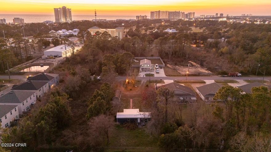 Back on Market..no fault of Seller.  
MULTI-FAMILY ZONING. The single wide and storage building are sold AS-IS.  Mobile Home was extensively remodeled and never occupied.    New roof in late 2020 and all systems work.  Excellent income property or investment!!  BUYER TO VERIFY ALL INFORMATION DEEMED IMPORTANT.