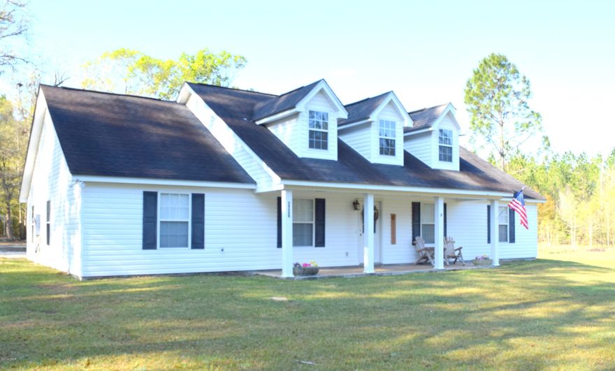 Situated on more than 11 acres in a quiet country setting you will find this 4 bedroom, 2.5 

bath beauty! Step inside to the spacious living room with cathedral ceilings, beautiful custom stone fireplace, eat-in kitchen equipped with an abundance of cabinets, pantry and nearby half bath. The master suite features an oversized walk-in closet, double vanity, shower and separate soaking tub. Enjoy your time outside on the front porch amongst the privacy from the surrounding timber. Property is located just off Bonnett Pond Rd, between Chipley and Vernon.